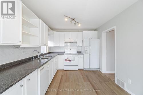 11 Humber Hill Avenue, Toronto (Lambton Baby Point), ON - Indoor Photo Showing Kitchen With Double Sink