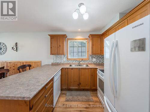 6 Awenda Avenue, Wasaga Beach, ON - Indoor Photo Showing Kitchen With Double Sink
