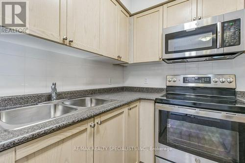 Ph4 - 4879 Kimbermount Avenue, Mississauga, ON - Indoor Photo Showing Kitchen With Double Sink