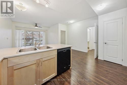 101 - 400 William Graham Drive, Aurora, ON - Indoor Photo Showing Kitchen With Double Sink