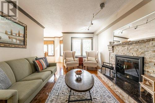 347 Alex Doner Drive, Newmarket, ON - Indoor Photo Showing Living Room With Fireplace
