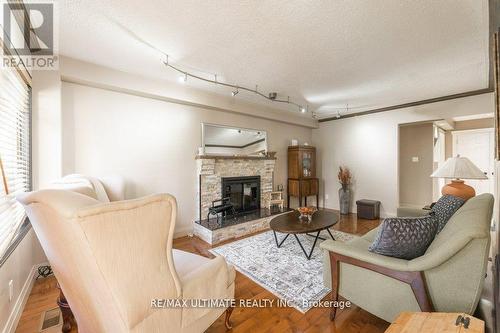 347 Alex Doner Drive, Newmarket, ON - Indoor Photo Showing Living Room With Fireplace