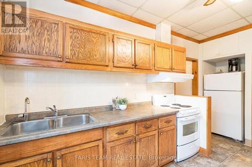 1497 7Th Line, Innisfil, ON - Indoor Photo Showing Kitchen With Double Sink