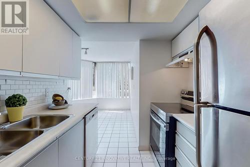 311 - 11753 Sheppard Avenue E, Toronto, ON - Indoor Photo Showing Kitchen With Double Sink