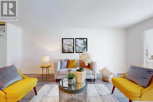 311 - 11753 Sheppard Avenue E, Toronto, ON - Indoor Photo Showing Living Room