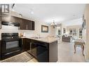 1089 Sunset Drive Unit# 407, Kelowna, BC  - Indoor Photo Showing Kitchen With Double Sink 