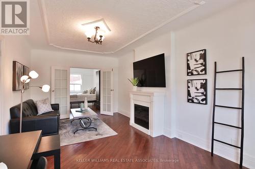 24 Coolmine Road, Toronto, ON - Indoor Photo Showing Living Room With Fireplace