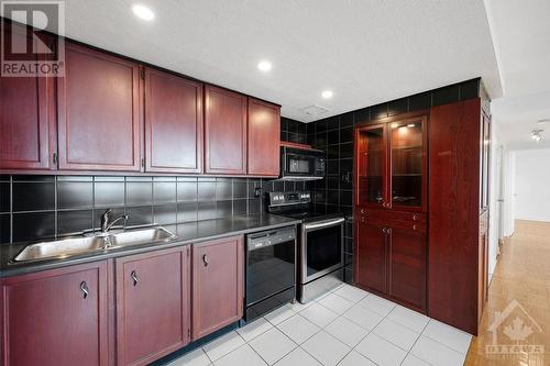 530 Laurier Avenue W Unit#2305, Ottawa, ON - Indoor Photo Showing Kitchen With Double Sink