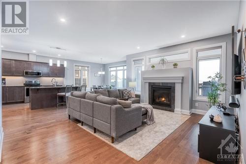 734 Meadowridge Circle, Ottawa, ON - Indoor Photo Showing Living Room With Fireplace