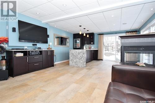 215 Sunset Bay, Estevan Rm No. 5, SK - Indoor Photo Showing Living Room With Fireplace