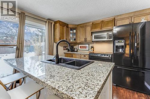 27 Virgilwood Crescent, Barrie, ON - Indoor Photo Showing Kitchen With Double Sink With Upgraded Kitchen