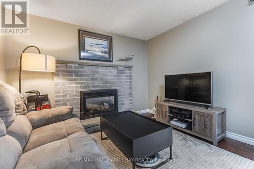 27 Virgilwood Crescent, Barrie, ON - Indoor Photo Showing Living Room With Fireplace