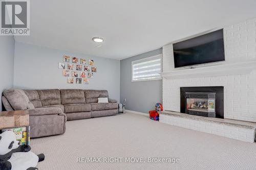 2248 Thomson Crescent, Severn, ON - Indoor Photo Showing Living Room With Fireplace
