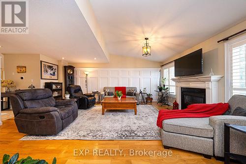 28 Thrushwood Trail, Kawartha Lakes, ON - Indoor Photo Showing Living Room With Fireplace