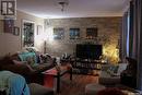 266 St John Street, Regina, SK  - Indoor Photo Showing Living Room With Fireplace 