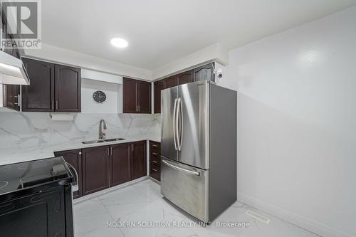 34 Potter Crescent, New Tecumseth, ON - Indoor Photo Showing Kitchen With Double Sink