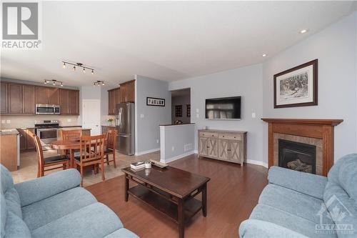 23 Hibiscus Way, Ottawa, ON - Indoor Photo Showing Living Room With Fireplace