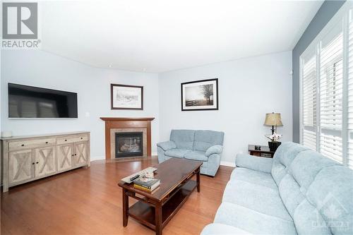 23 Hibiscus Way, Ottawa, ON - Indoor Photo Showing Living Room With Fireplace
