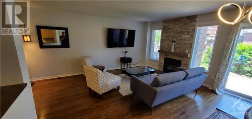 258 Freedom Private, Ottawa, ON - Indoor Photo Showing Living Room With Fireplace