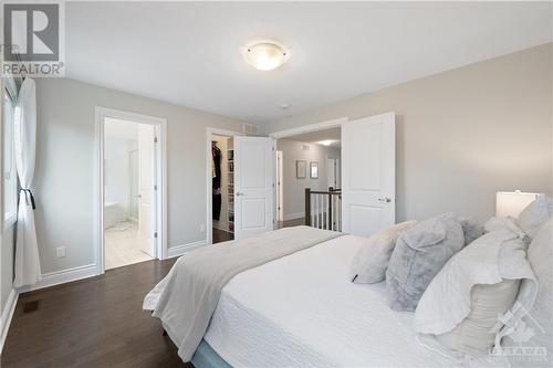 Primary bedroom with view of ensuite and large walk-in closet. - 109 Spindrift Circle, Manotick, ON - Indoor Photo Showing Bedroom