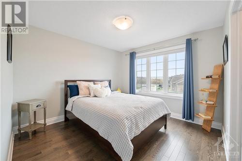 Large bedroom features a large walk-in closet. - 109 Spindrift Circle, Manotick, ON - Indoor Photo Showing Bedroom