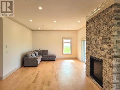 23 Main Road, Port Au Port, NL - Indoor Photo Showing Living Room With Fireplace