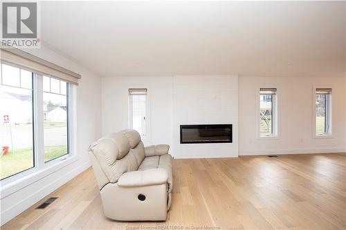 33 Donat Cres, Dieppe, NB - Indoor Photo Showing Living Room With Fireplace