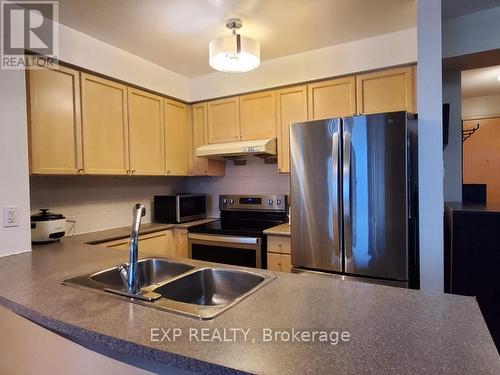 405 - 60 Brian Harrison Way, Toronto, ON - Indoor Photo Showing Kitchen With Double Sink