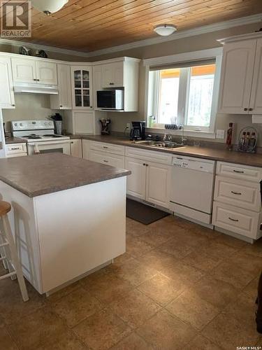 Green Acres Acreage, Turtle Lake, SK - Indoor Photo Showing Kitchen With Double Sink