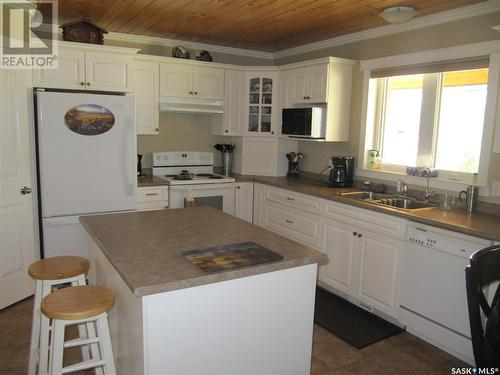 Green Acres Acreage, Turtle Lake, SK - Indoor Photo Showing Kitchen With Double Sink