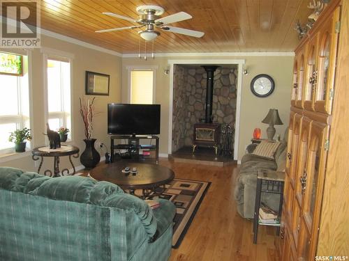 Green Acres Acreage, Turtle Lake, SK - Indoor Photo Showing Living Room With Fireplace