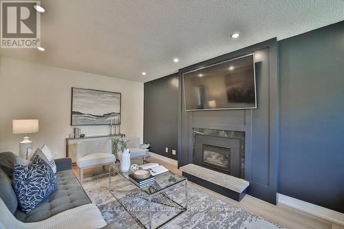 70 Rolling Acres Drive, Whitby, ON - Indoor Photo Showing Living Room With Fireplace