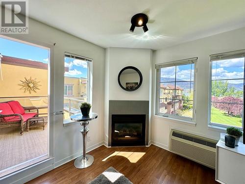 7600 Cottonwood Drive Unit# 409, Osoyoos, BC - Indoor Photo Showing Living Room With Fireplace