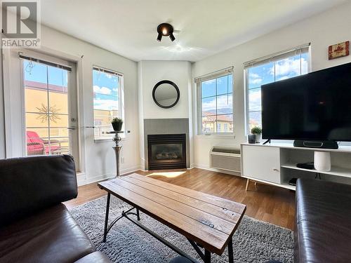 7600 Cottonwood Drive Unit# 409, Osoyoos, BC - Indoor Photo Showing Living Room With Fireplace