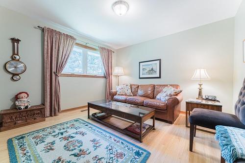 Bedroom # 2 boasts hardwood flooring and oversized window. - 28 Sunset Drive, Simcoe, ON - Indoor Photo Showing Living Room