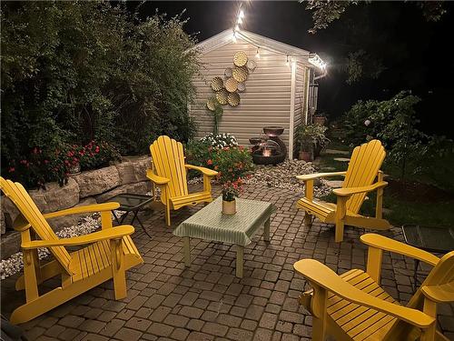 Serene back yard setting for relaxation and entertainment pleasures. - 28 Sunset Drive, Simcoe, ON - Outdoor With Deck Patio Veranda