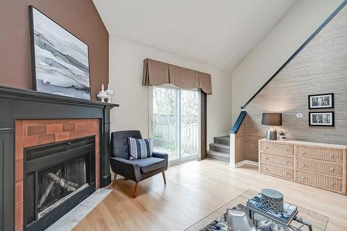 935 King Road|Unit #19, Burlington, ON - Indoor Photo Showing Living Room With Fireplace