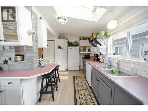 2112 Kokanee  N Court, Cranbrook, BC - Indoor Photo Showing Kitchen With Double Sink