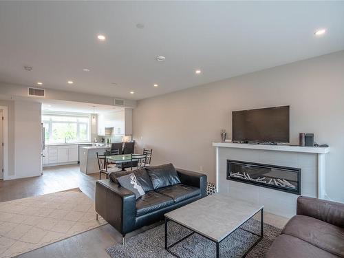 5-180 First Ave, Qualicum Beach, BC - Indoor Photo Showing Living Room With Fireplace