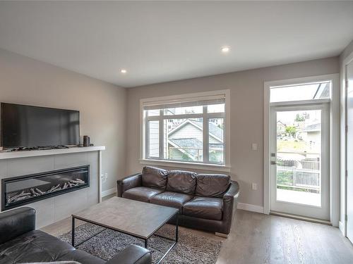 5-180 First Ave, Qualicum Beach, BC - Indoor Photo Showing Living Room With Fireplace