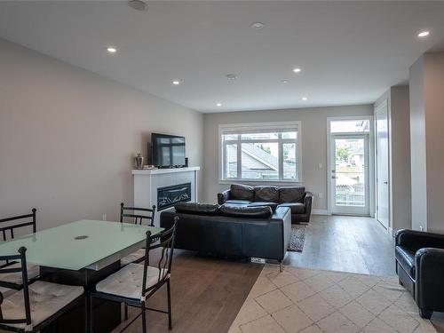 5-180 First Ave, Qualicum Beach, BC - Indoor Photo Showing Living Room With Fireplace