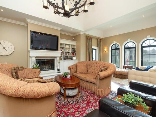 Living room - 42 Rue De Cambridge, Hudson, QC - Indoor Photo Showing Living Room With Fireplace