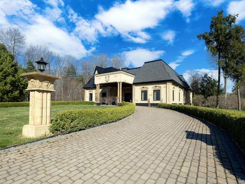 Back facade - 42 Rue De Cambridge, Hudson, QC - Outdoor With In Ground Pool With Deck Patio Veranda