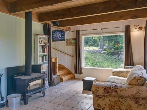 Living room - 241 Ch. Després, La Minerve, QC - Indoor With Fireplace