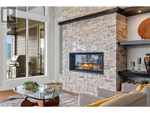 8856 Somerset Place, Vernon, BC - Indoor Photo Showing Living Room With Fireplace