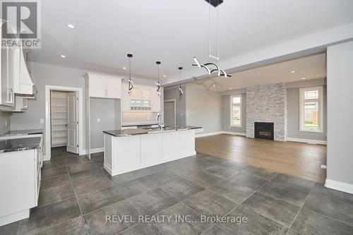 26 Swan Avenue, Pelham, ON - Indoor Photo Showing Kitchen With Fireplace