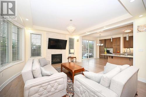 364 Wisteria Way, Oakville, ON - Indoor Photo Showing Living Room With Fireplace