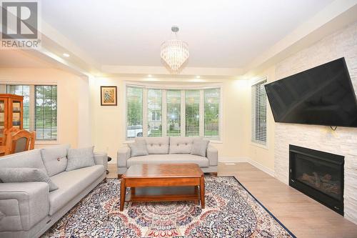 364 Wisteria Way, Oakville, ON - Indoor Photo Showing Living Room With Fireplace