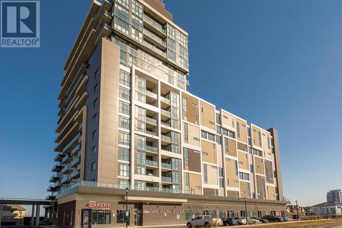 306 - 550 North Service Road, Grimsby, ON - Outdoor With Balcony With Facade