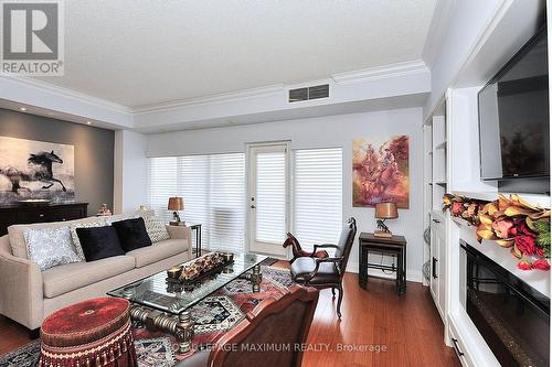 419 - 83 Woodbridge Avenue, Vaughan, ON - Indoor Photo Showing Living Room With Fireplace